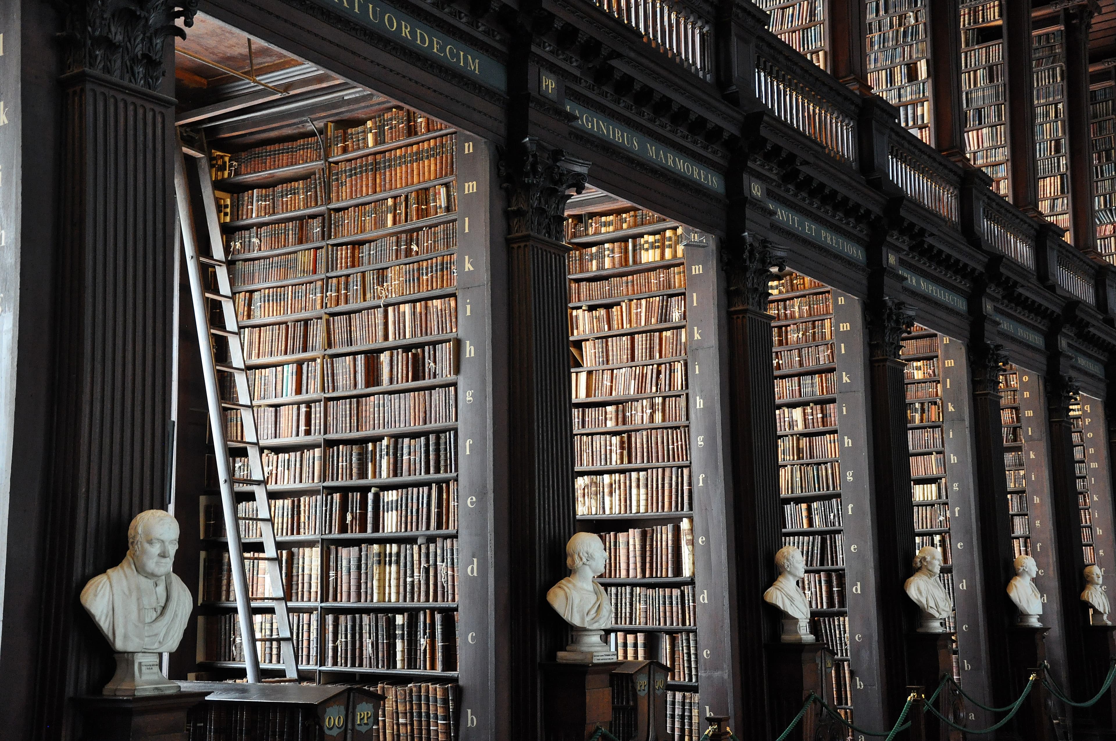 Historic library stacks representing comprehensive MBA application support